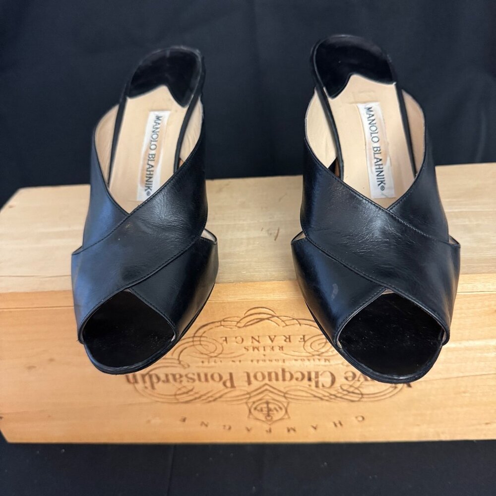 Manolo Blahnik high heeled black leather cross-strapped mule